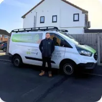 Roger Draper, founder of Expert Roofing Services, with the company van