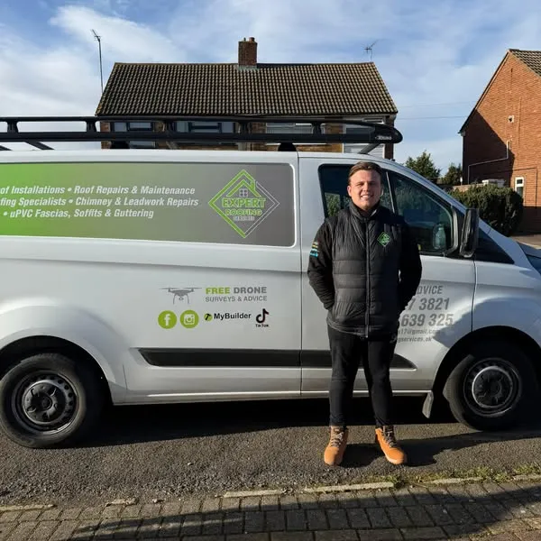 Roger Draper, founder of Expert Roofing Services, with the company van